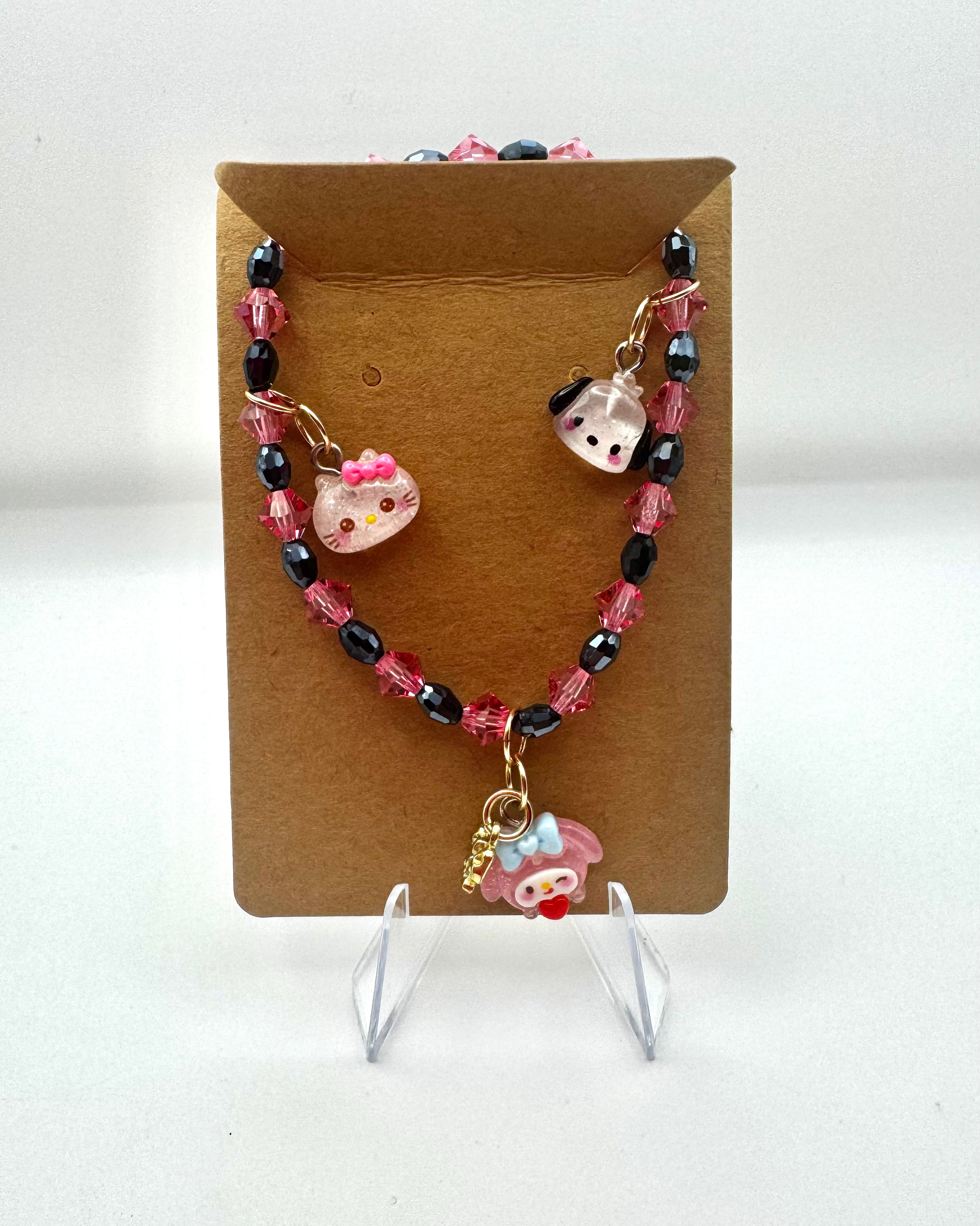 Pulsera de gatito rosa y negra